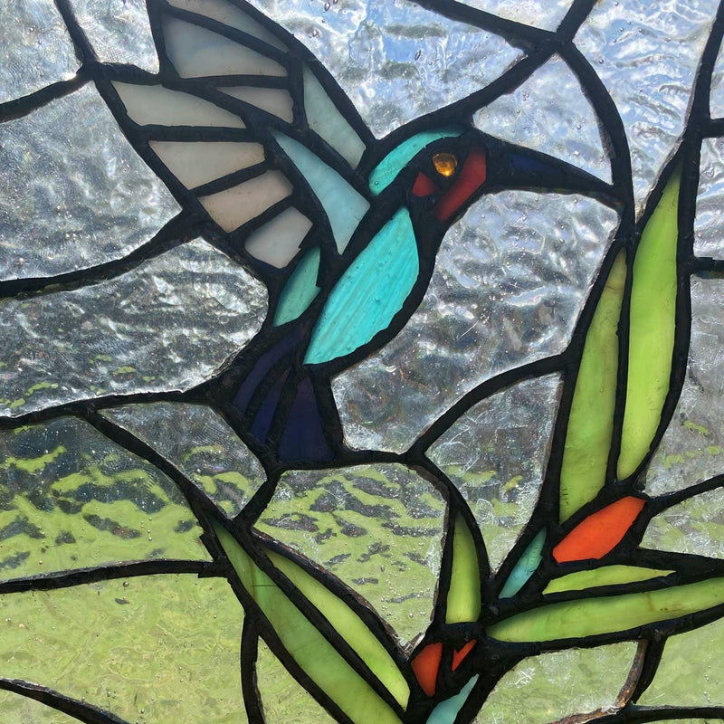 Hummingbird Stained Glass Hanging - A close-up view of the stained glass panel featuring a beautifully detailed hummingbird design.